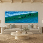 21 Dolphins by Aaron Chang, shown in a coastal living room