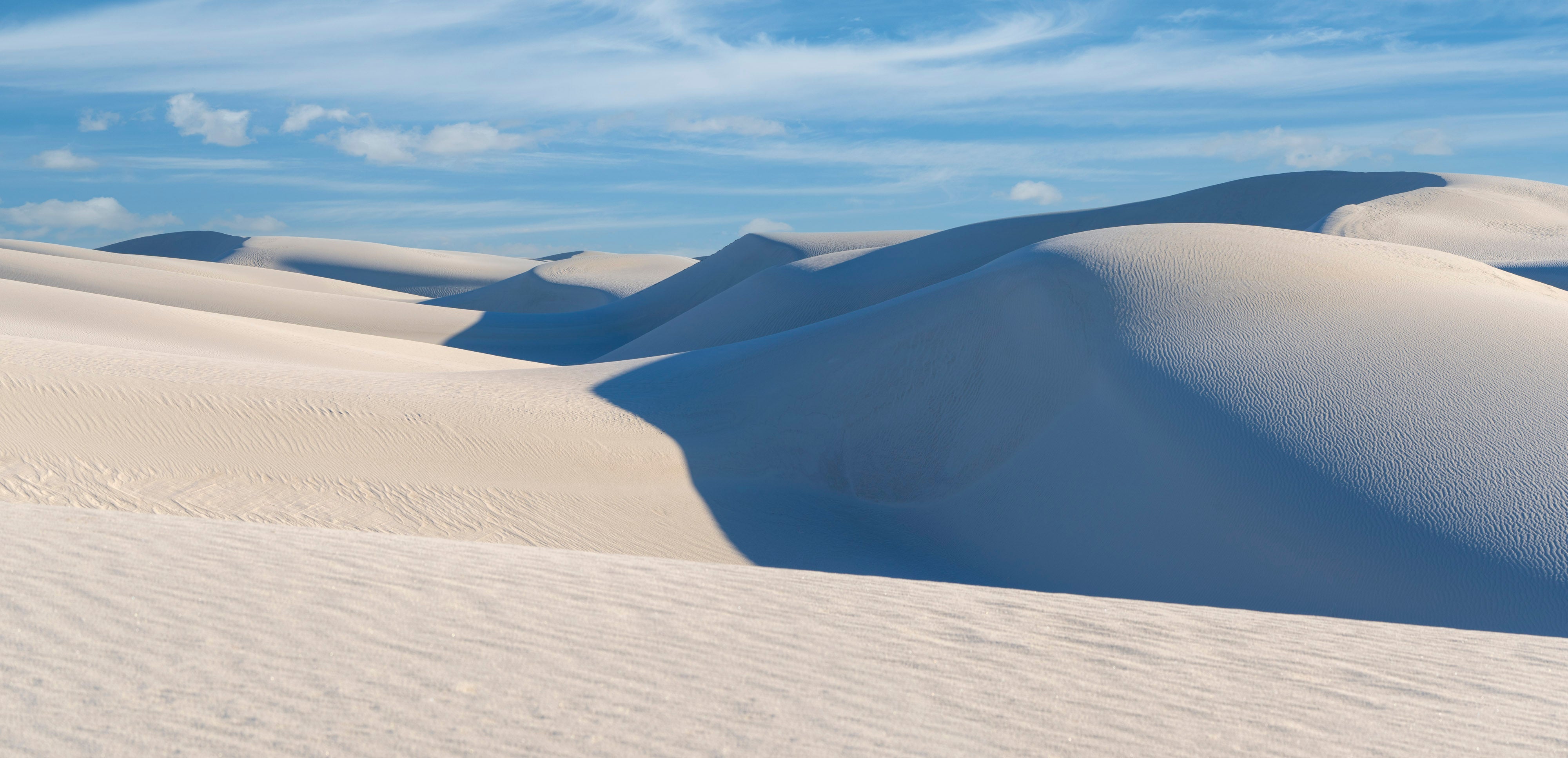 Dune Sky – fine art panoramic photograph of sunlit white dunes under a clear sky at White Sands National Park, New Mexico, by Aaron Chang