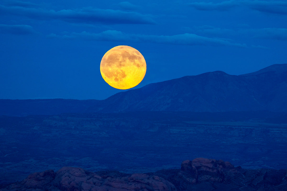Moab Moon – fine art photograph of a full moon rising over the La Sal Mountains outside Moab, Utah, by Aaron Chang