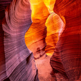 Rattlesnake Canyon – fine art photograph of a narrow sandstone passage glowing orange in Rattlesnake Canyon near Page, Arizona, by Aaron Chang