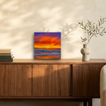 Days End 12" x 12" wall art on a walnut sideboard