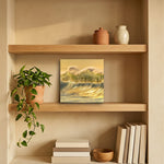 Glimmer 12" x 12" wall art in an oak shelf niche