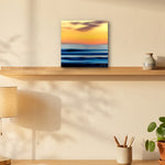 Last Surf 12" x 12" wall art on a shelf above an oak desk