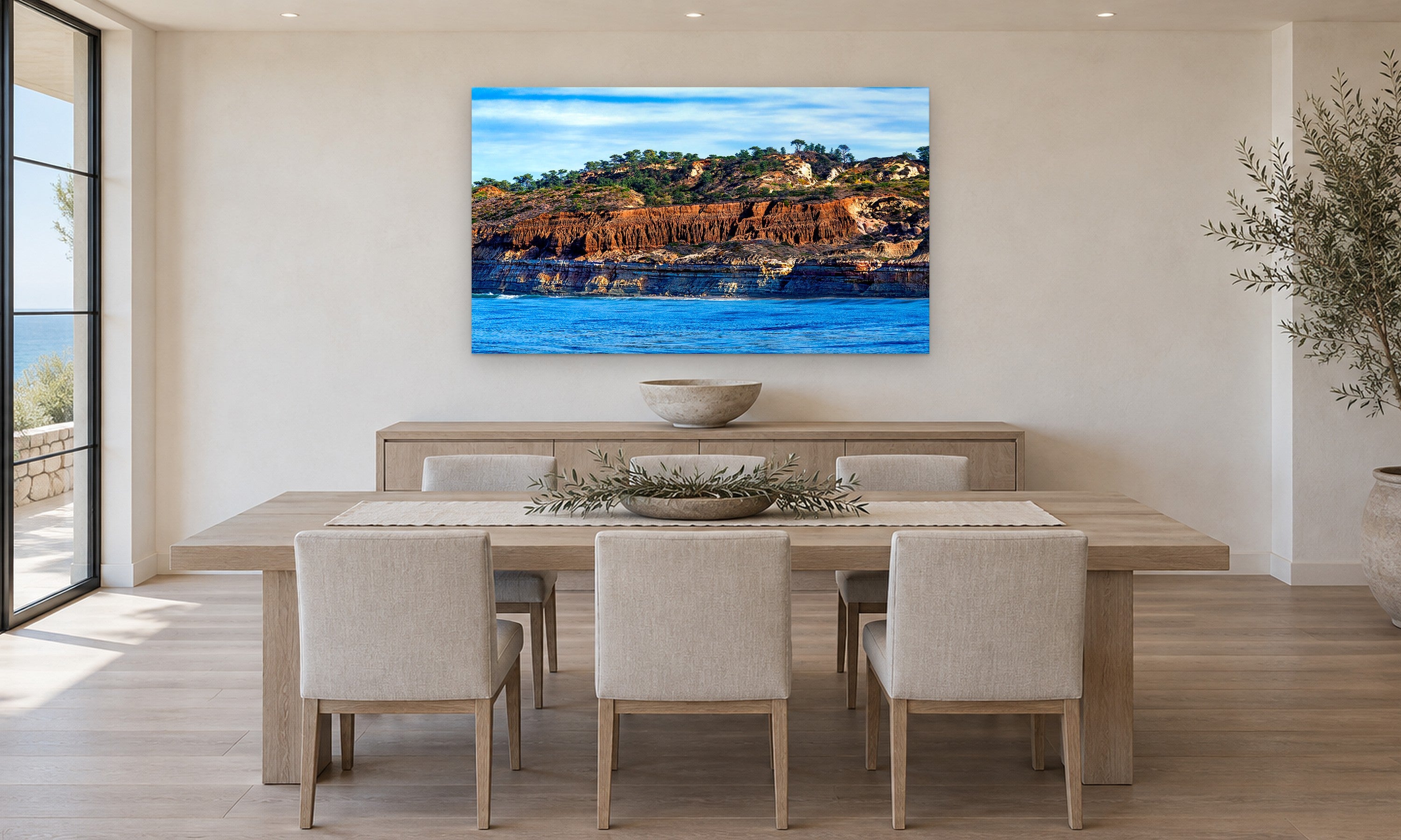 Torrey Pines Bluff by Aaron Chang, shown in a coastal dining room