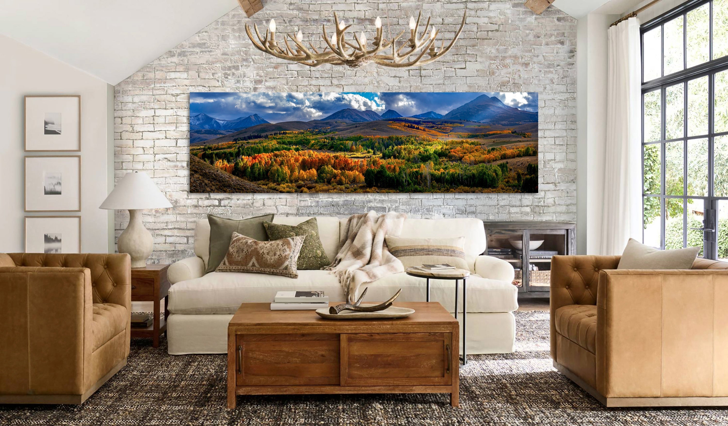 Sierra High Country by Aaron Chang, shown in a living room with a white brick wall